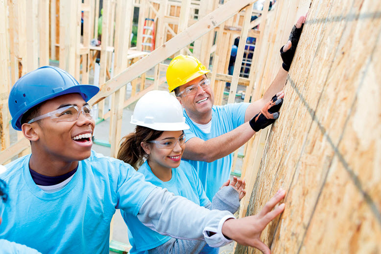 Volunteers doing construction.