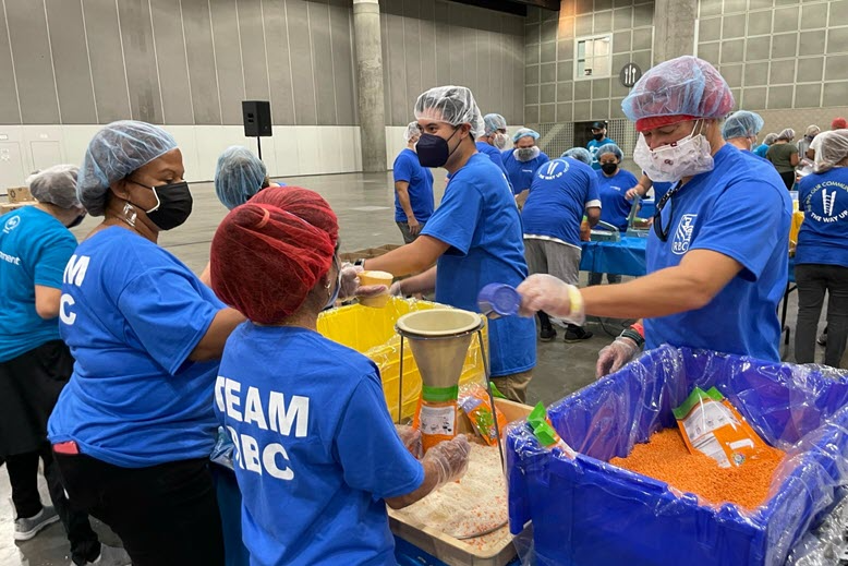 rbc-volunteers-packing-meals-together