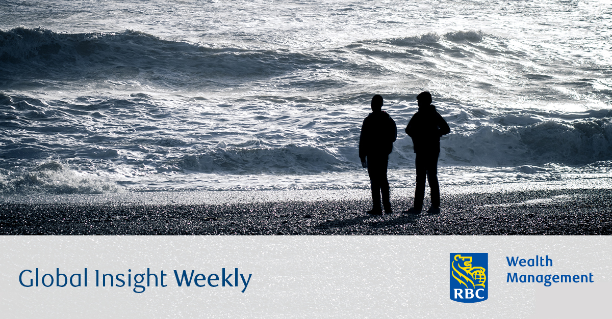 Two people looking at the sea