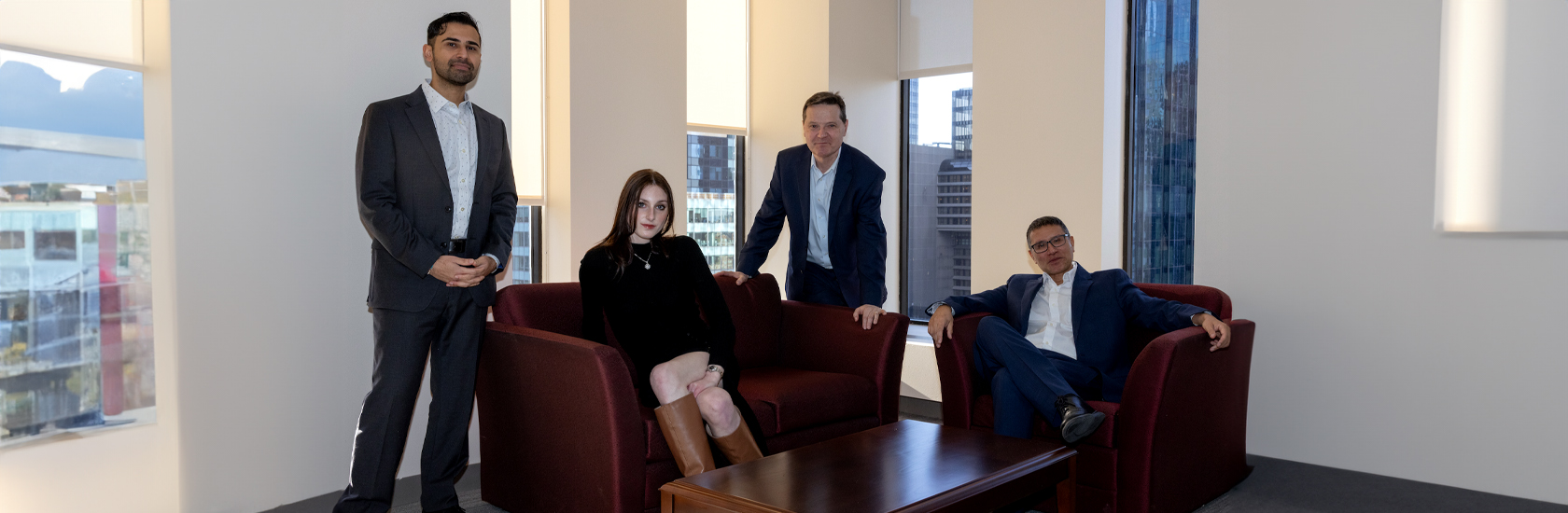 Team Seated in Office