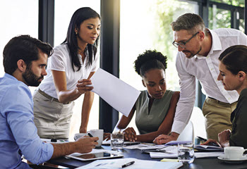 Young professionals around a table