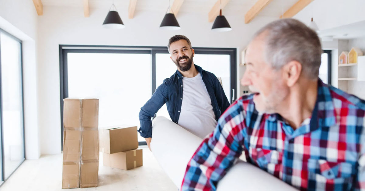 Father helping adult son move