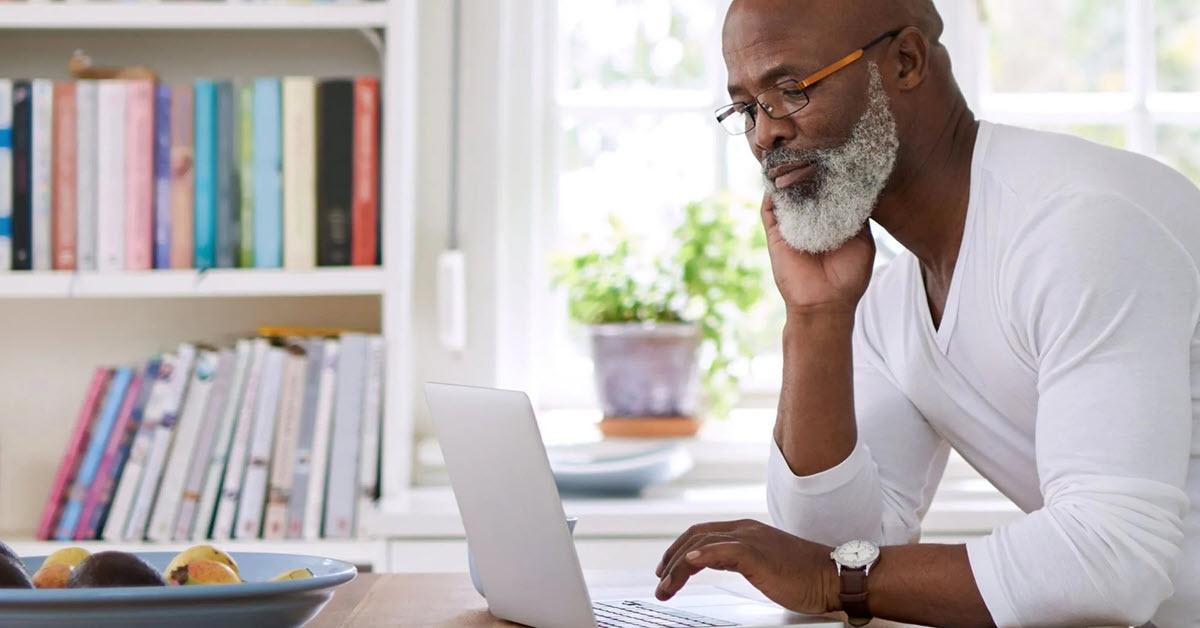 Man using computer at table