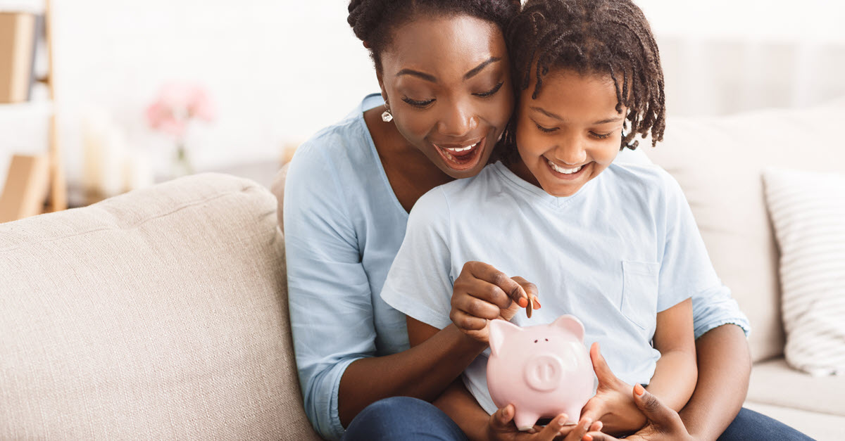 Child with Piggy Bank