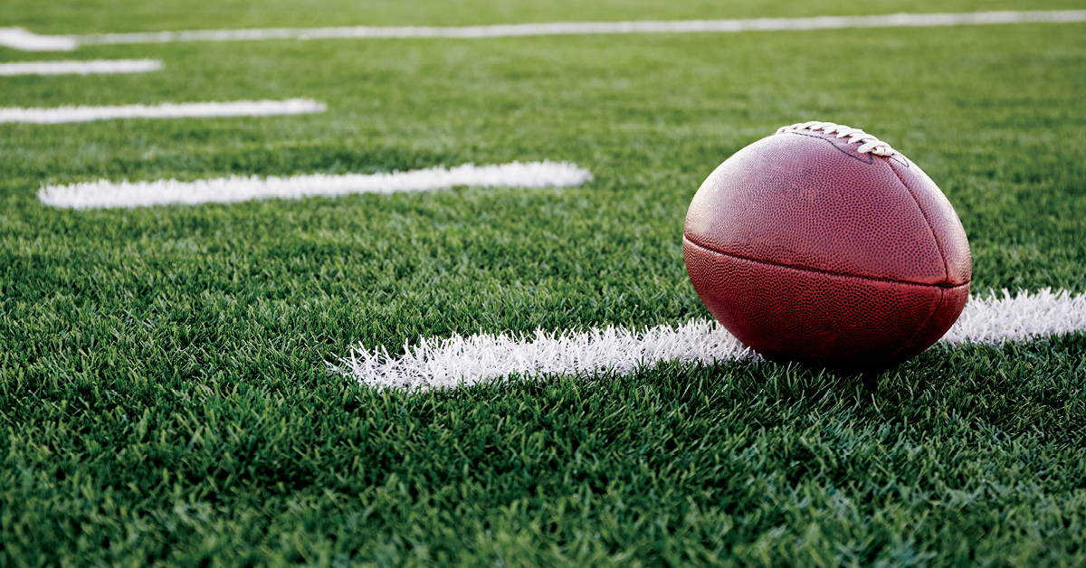 Football sitting on a field