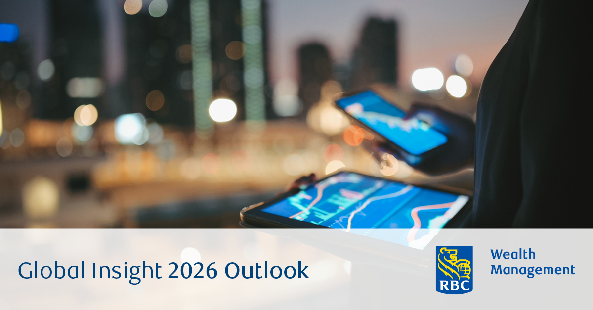 Close-up of someone holding a tablet and phone watching the market index on a balcony at night