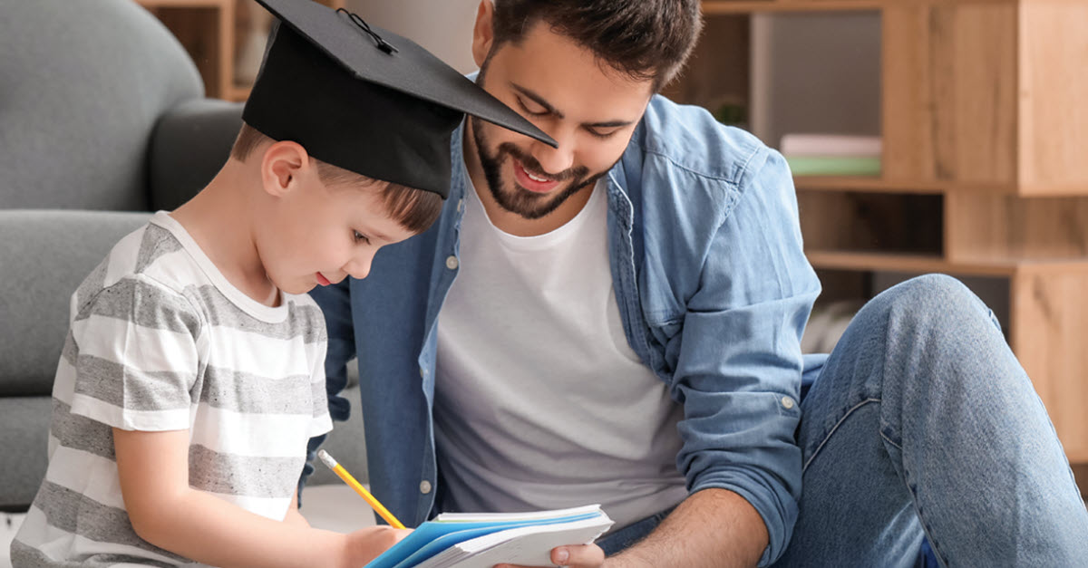 Father and son starting college savings plan early