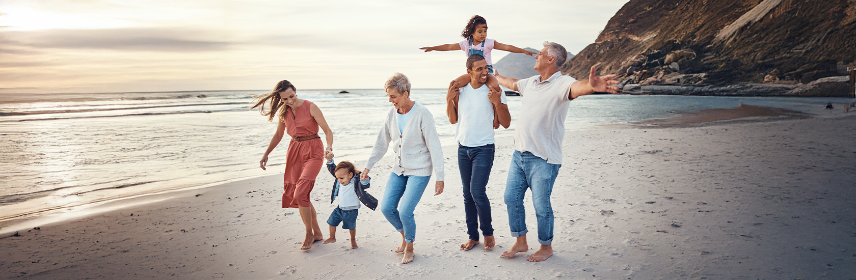 Family walking on the beach