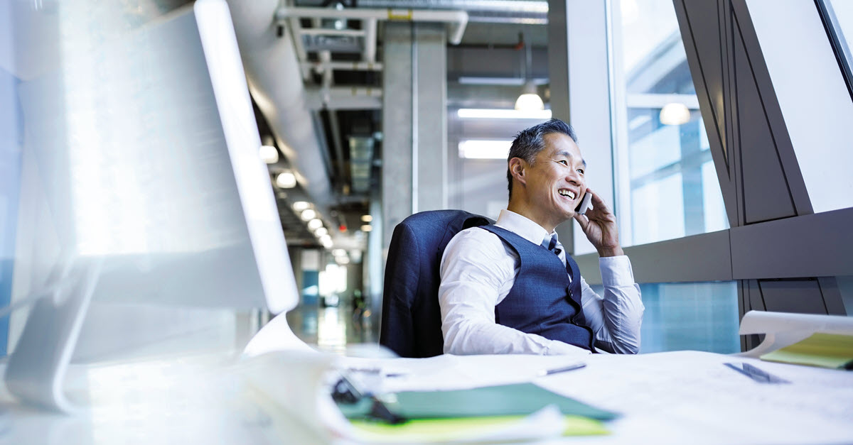 A man on a business phone call