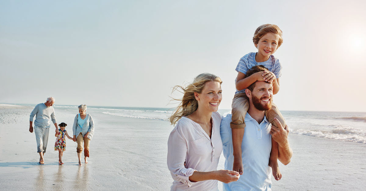 Family walking on the beach