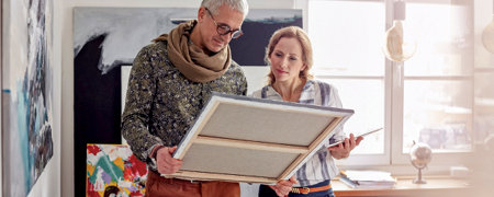 Image of people looking at art
