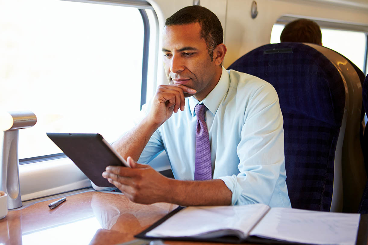 Man with iPad travel