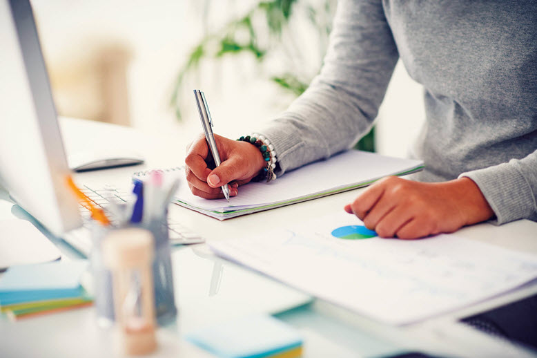 Female at desk doing paperwork