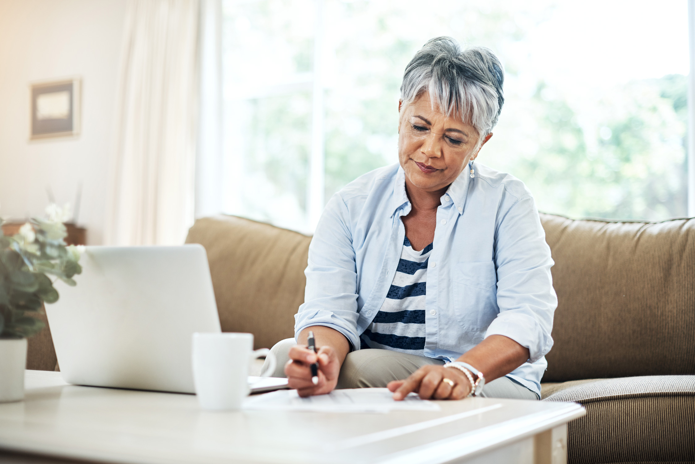 Mature woman reviewing documents