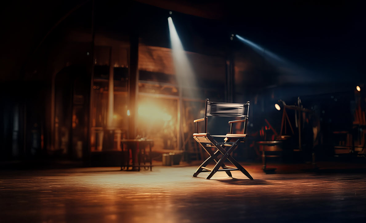 Director chair on a stage with spotlight