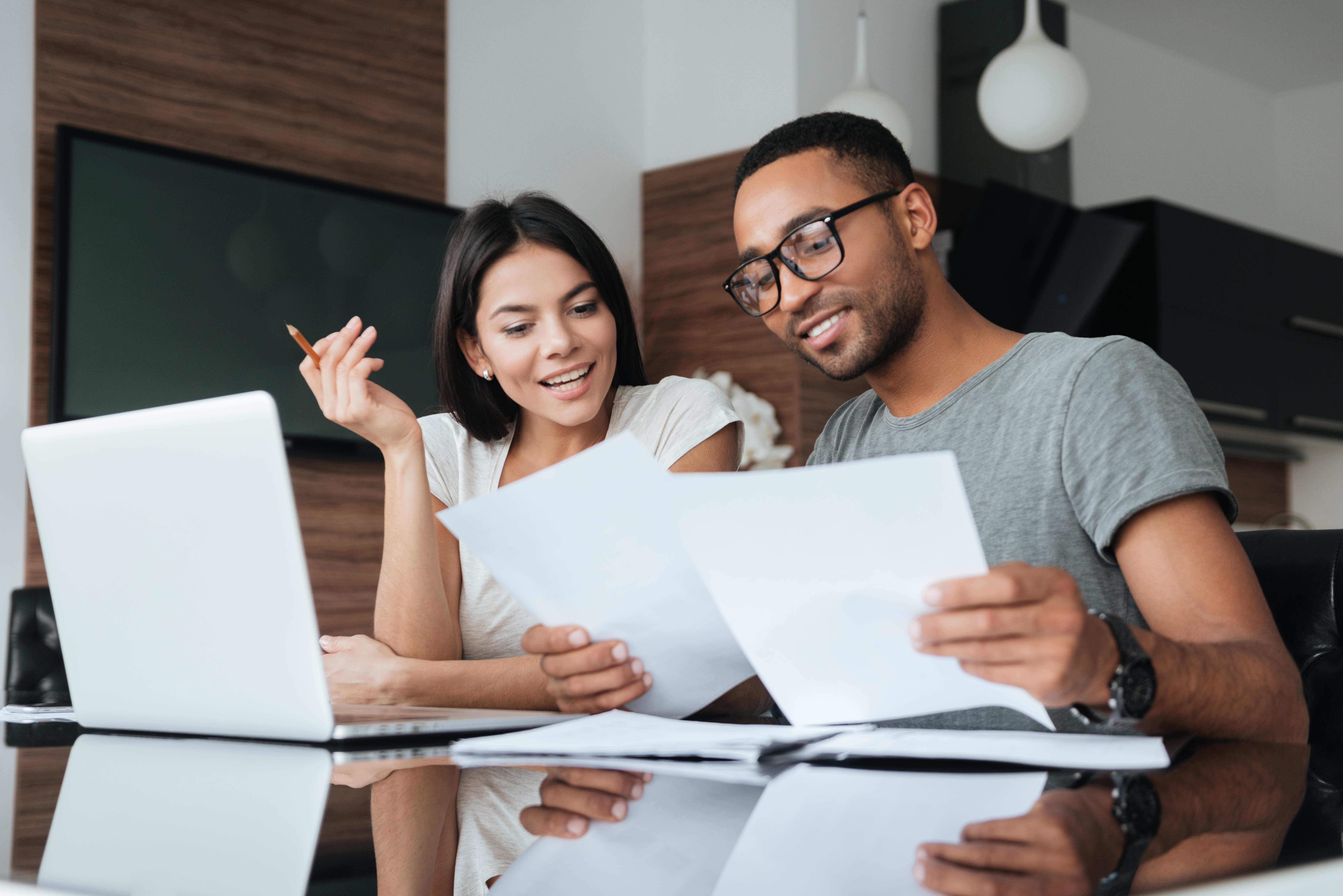 two people reviewing cash accounts